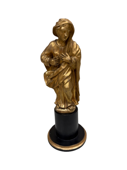Continental Giltwood Figure of the Madonna Annunciata on Ebonized Pedestal