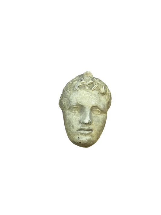 Classical Relief Plaque Fragment Depicting a Youthful Male Head