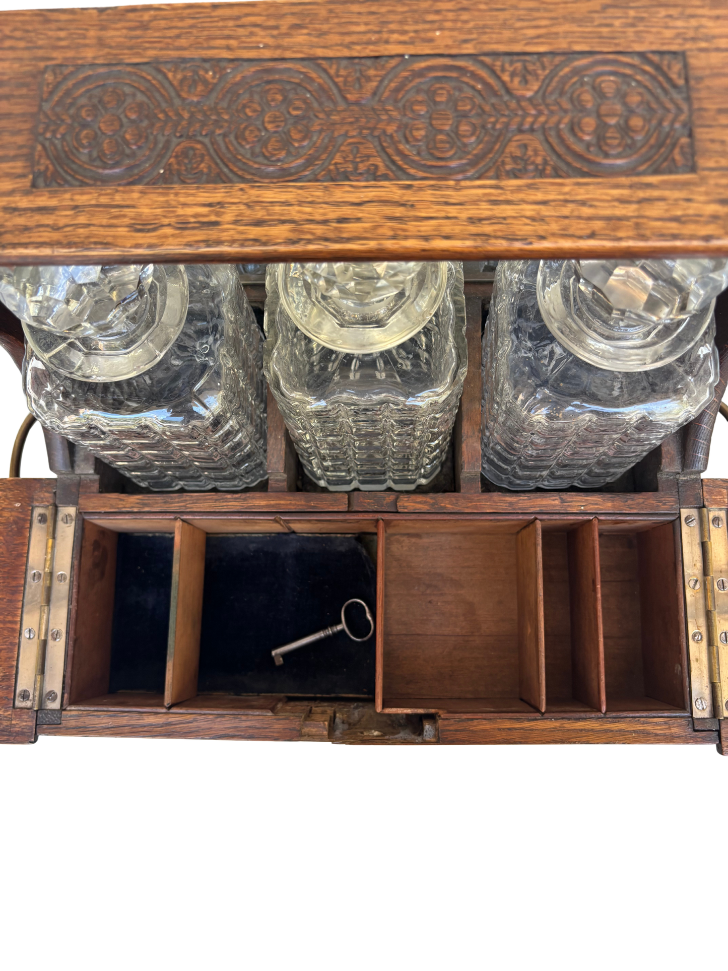English Victorian Carved Oak Three-Bottle Tantalus and Games Compendium with Cut Glass Decanters, Circa 1880–1900