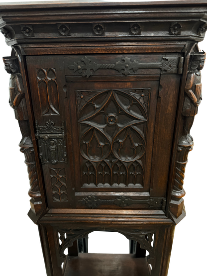 Late 19th Century Gothic Revival Carved Oak Cabinet with Figural Supports